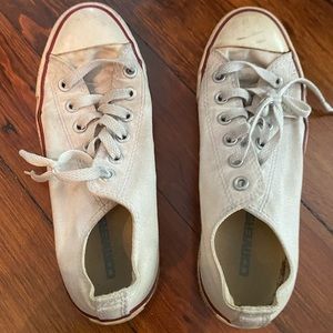 Worn in white converse